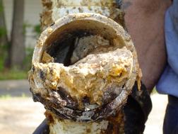 a grease clogged sewer pipe