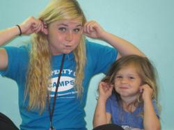 Staff and camper monkeying around