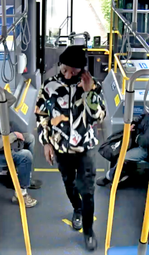 Suspect_2_on_a_bus.png
