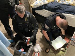 officers_search_bedroom.jpg
